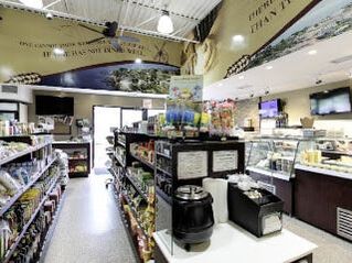 Interior of a bakery with shelves lined with assorted packaged products in Greenway-Chaplin, Cambridge, Ontario