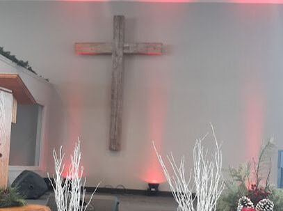 Interior of a church with a cross on the wall in Littles Corners, Cambridge, Ontario