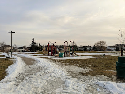 Distant shot of a playground with scattered snow on the ground in Littles Corners, Cambridge, Ontario