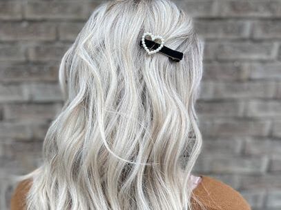 Back of woman sporting silver grey hair in Blair Road, Cambridge, Ontario