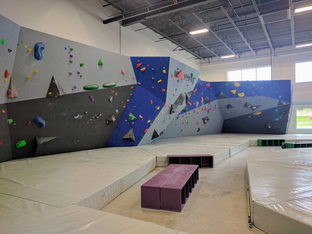 Interior of a climbing gym with colourful rock climbing wall in Hespeler Village, Cambridge, Ontario